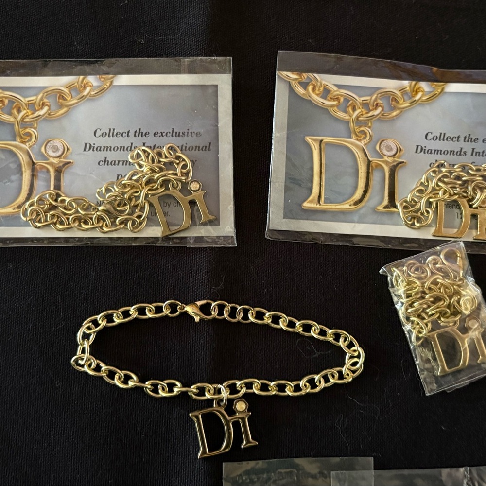 Diamond International Gold Charm Bracelet Set. 8 bracelets multiple charms. - Picture 2 of 15